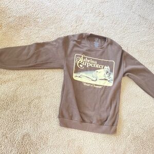 Brand new.  From her concert.  Never worn